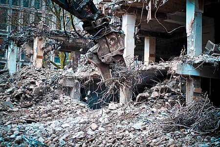 crashed concrete building during daytime thumbnail