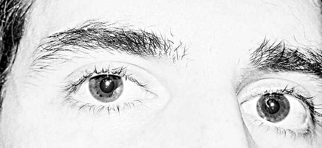 close up photo of man's eye thumbnail