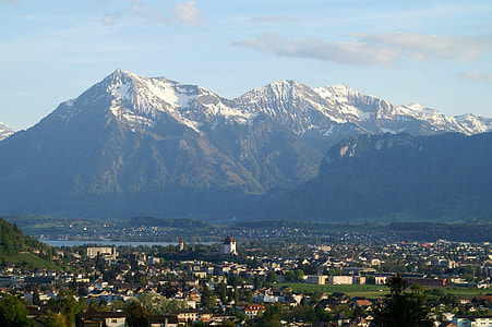 High Mountains Behind the City in Steffisburg, Switzerland thumbnail