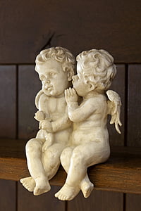 two ceramic cherub figures thumbnail
