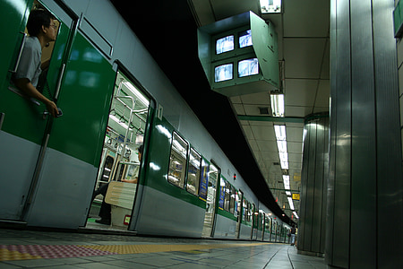 person standing inside train thumbnail