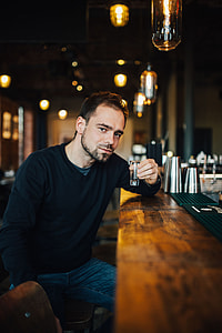 Handsome young man in a pub thumbnail