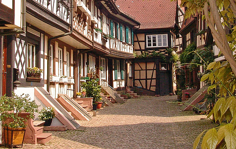 white and brown wooden houses at daytime thumbnail