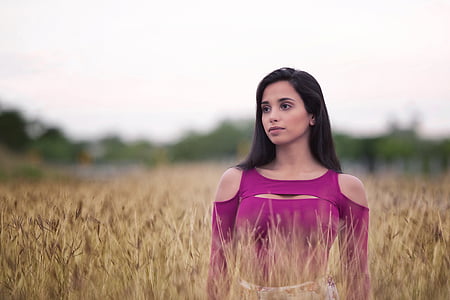 woman wearing purple cold-shoulder top in wheat field thumbnail