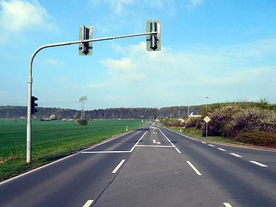 gray road with street lights during daytime photography thumbnail