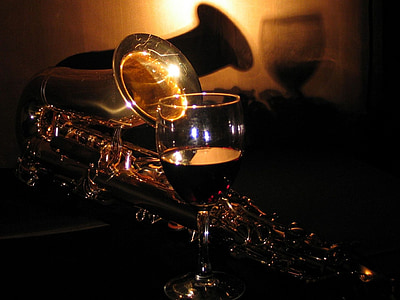clear wine glass filled with black liquid thumbnail