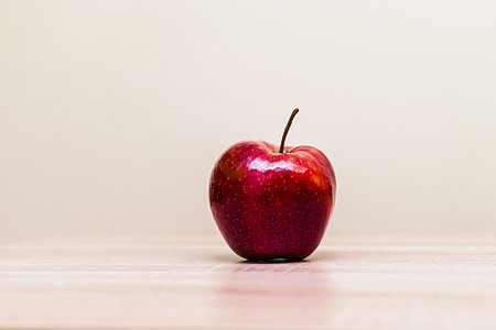 red apple on the table thumbnail