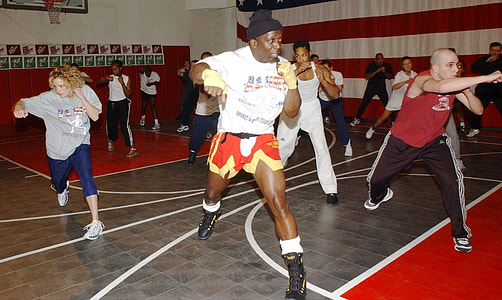 crowd of people exercising inside the gym thumbnail