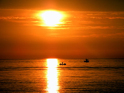 Silhouette of People on Boat during Golden Hours thumbnail