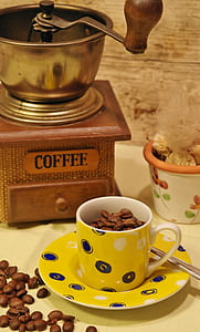 white and yellow ceramic mug with saucer thumbnail
