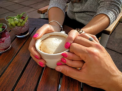 person touching white mugs thumbnail