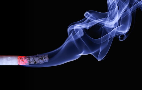 white smoke on lighted cigarette stick thumbnail