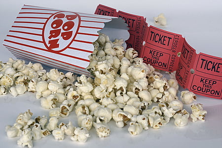 cooked popcorn near paper container thumbnail