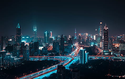 lighted high rise building at nighttime thumbnail