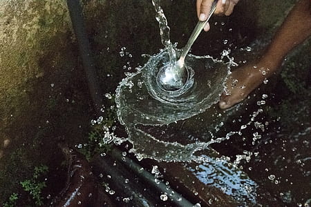Person Holding Stainless Steel Spoon thumbnail