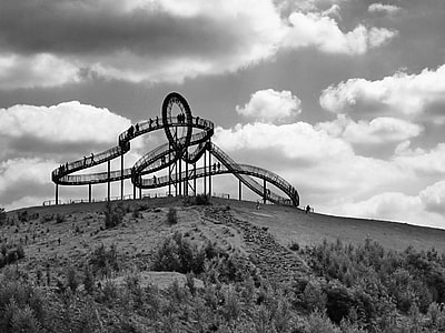 grayscale photo of roller coaster trail thumbnail