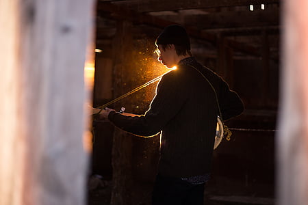 person playing instrument thumbnail