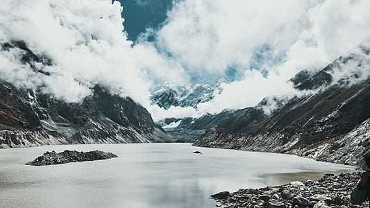 gray mountain cover by snow during daytime thumbnail