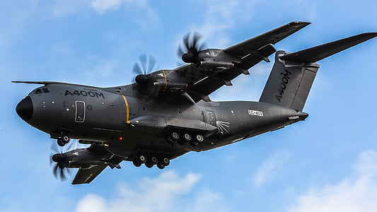 black A400M fighter plane in the sky thumbnail