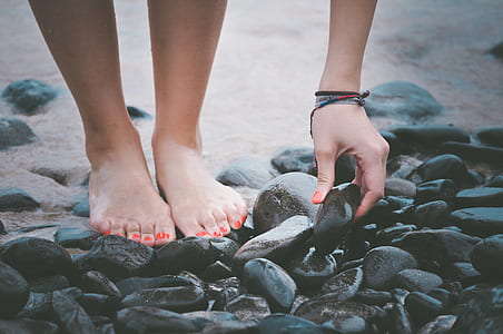 person holding black rock thumbnail