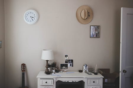 table lamp and R2-D2 figure on white desk thumbnail