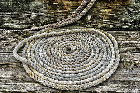 Grey Braided Rope on Wooden Plank thumbnail