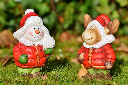 two snowman reindeer statuettes on garden thumbnail