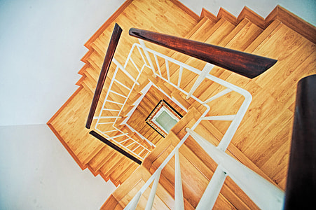 brown wooden spiral stairs thumbnail