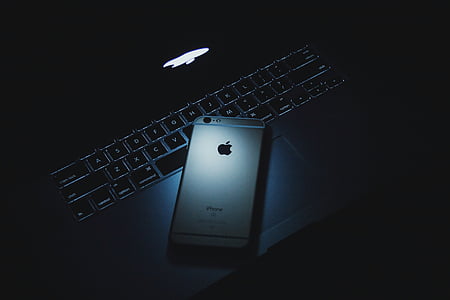 gold iPhone 6s on MacBook Pro thumbnail