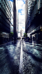 people between two buildings thumbnail
