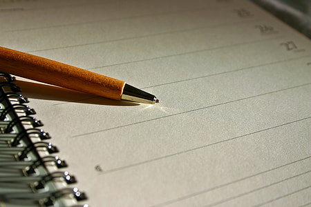brown pen on opened page notebook thumbnail
