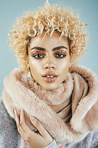 woman wearing gray and brown fur coat thumbnail
