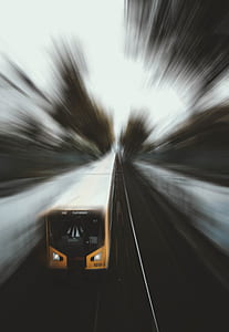 timelapse photography of yellow transit train thumbnail