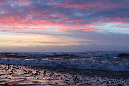 body of water under blue and white sky at golden hour thumbnail