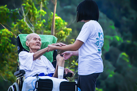 girl holding his grandmother hand thumbnail