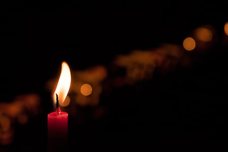 shallow focus photo of lighted candle thumbnail