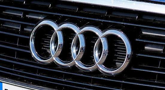 silver Audi emblem thumbnail