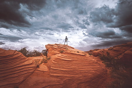 person standing on top of canyon thumbnail