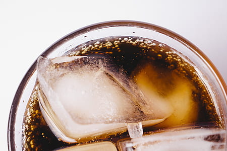 soda in glass with ice cubes thumbnail