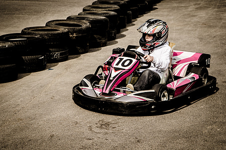 person riding go-kart on field thumbnail