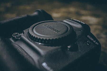 black Canon EOS 1D camera thumbnail