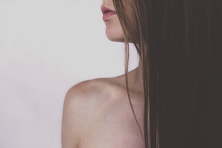 closeup photo of topless woman thumbnail