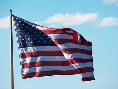 USA flag on pole during daytime thumbnail