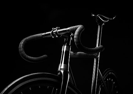 grey scale photography of road bicycle with black background thumbnail