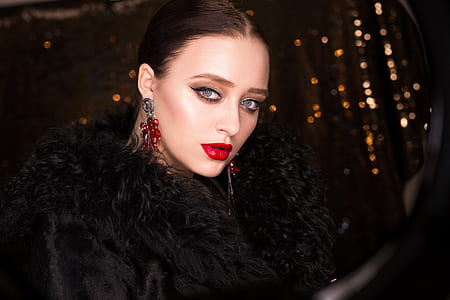 woman wearing black fur accent top thumbnail