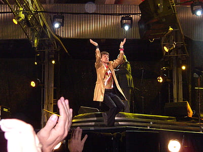 man performing on stage thumbnail