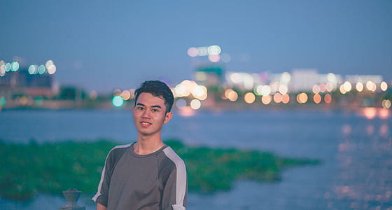 Boy in Gray Crew-neck Shirt Looking Straight to the Camera thumbnail