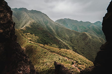 green mountains during daytime thumbnail