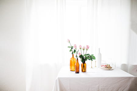 pink flowers on table thumbnail