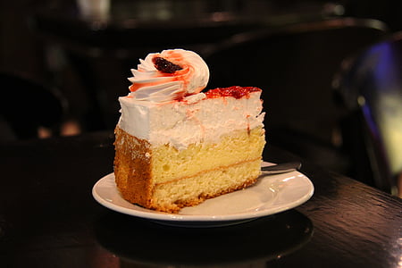 sliced cake on round ceramic plate thumbnail